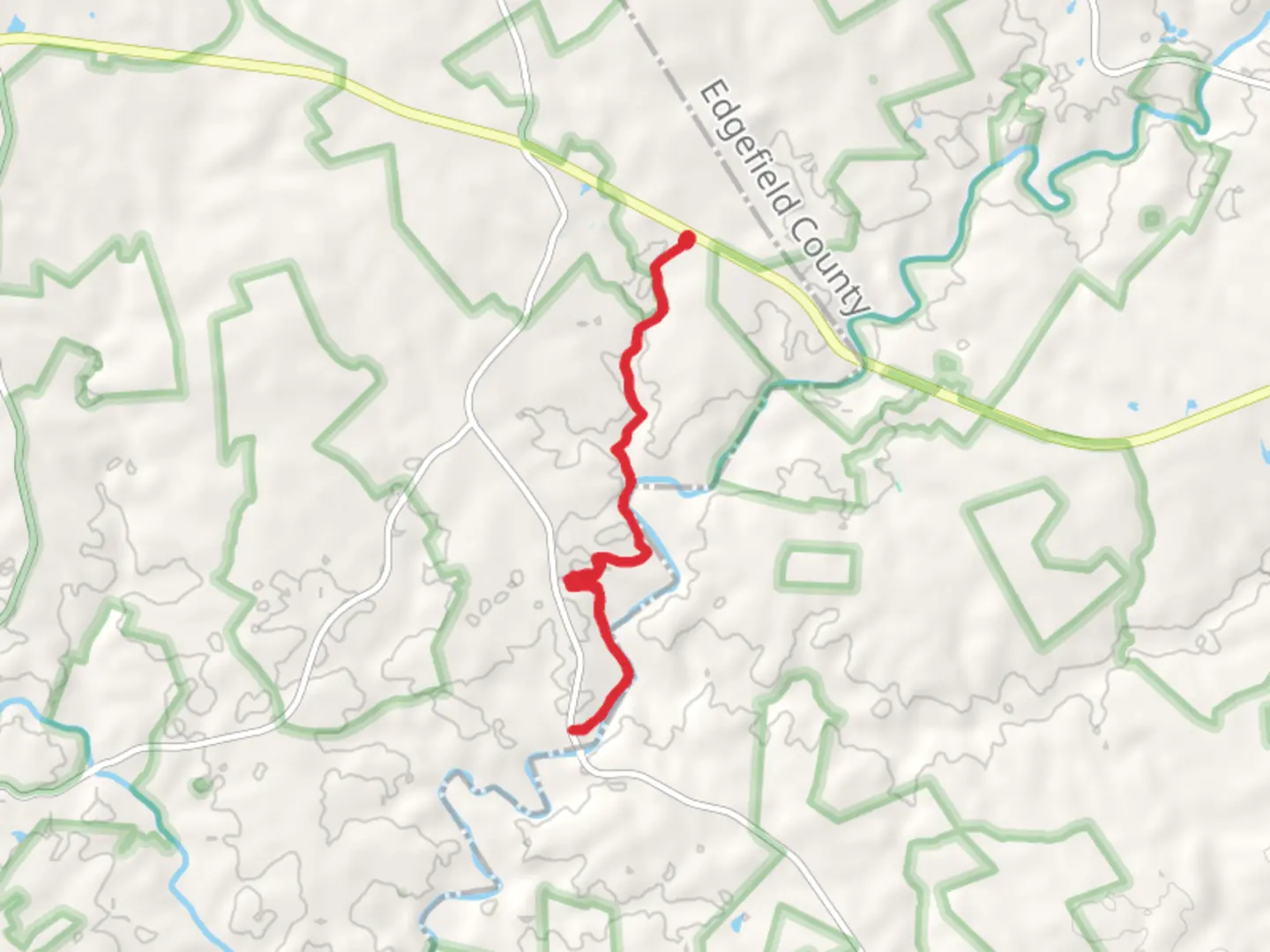 An image depicting the trail Turkey Creek via Wine Creek Trail and its surrounding area.