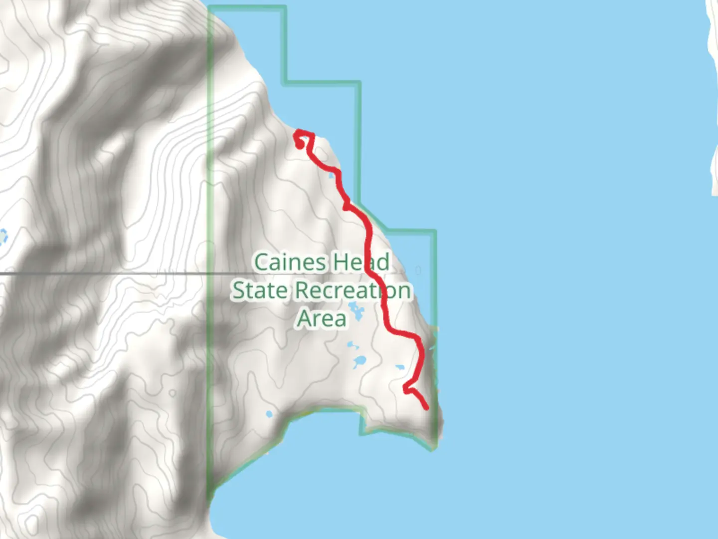 An image depicting the trail Caines Head - Fort Trail from Derby Cove Cabin and its surrounding area.