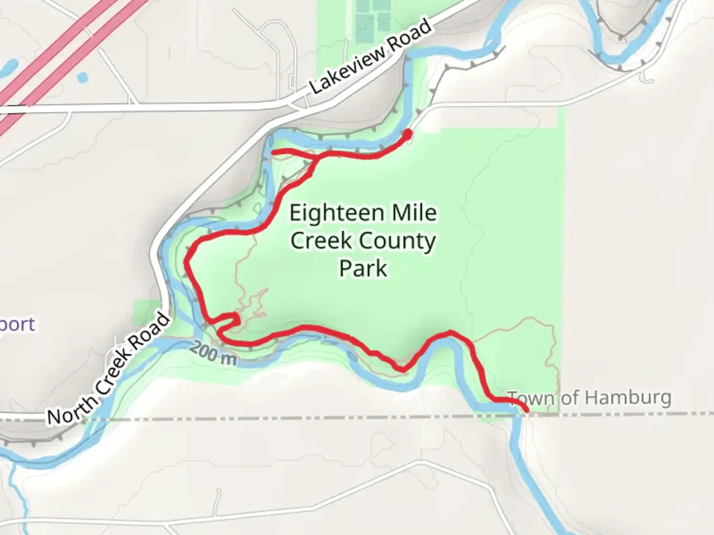 An image depicting the trail Eighteen Mile Creek County Park and its surrounding area.