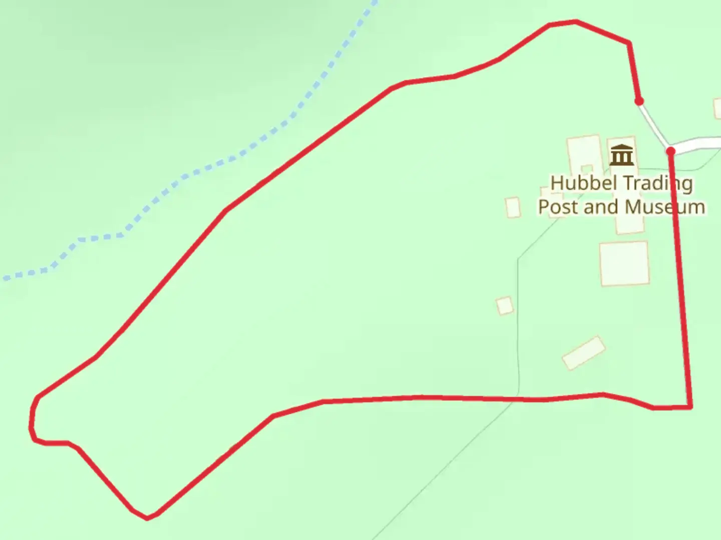 An image depicting the trail Hubbell Trading Post National Historic Site Loop and its surrounding area.