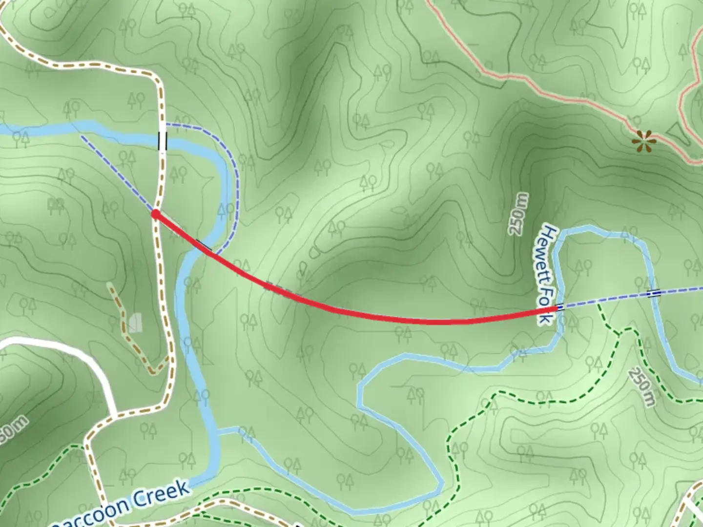An image depicting the trail Hewett Fork - Moonville Rail Trail and its surrounding area.