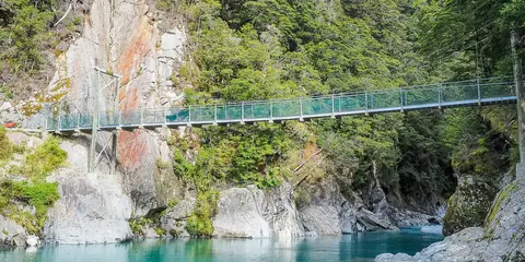 An image depicting the trail Blue Pools Track and its surrounding area.