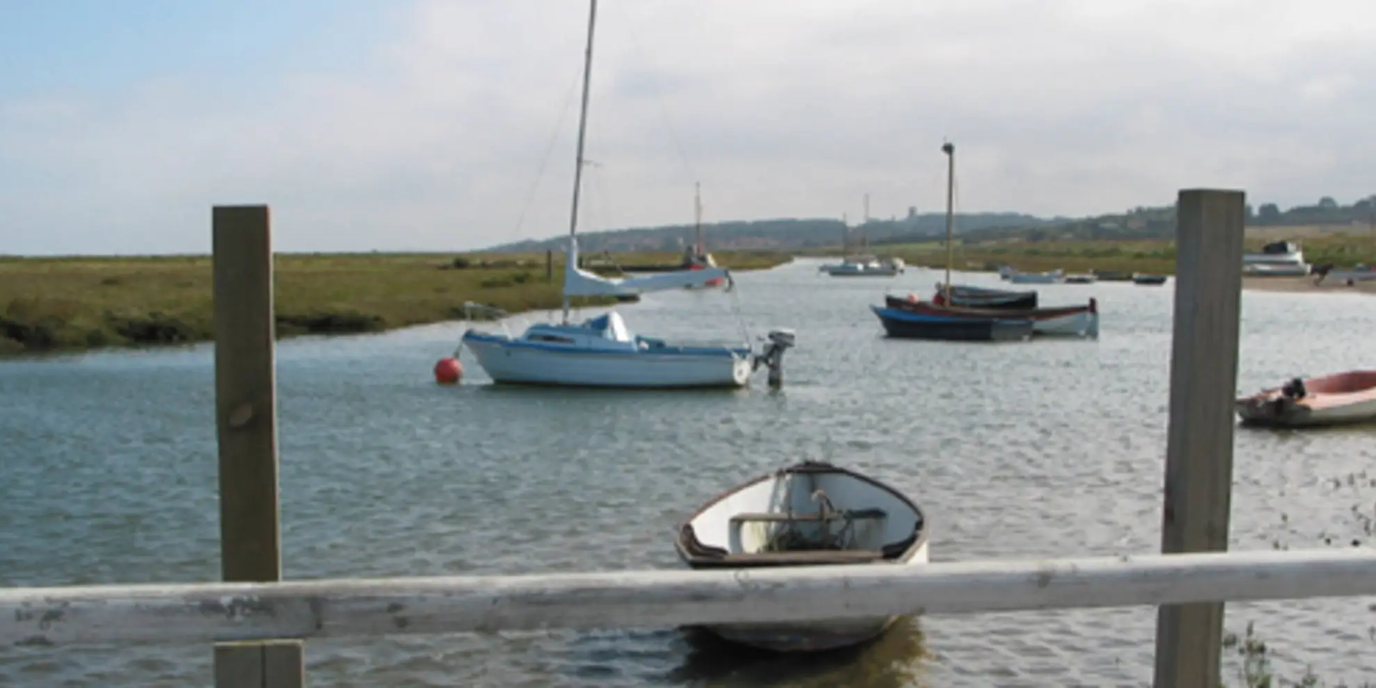 An image depicting the trail Morston Salt Marshes from Morston Quay and its surrounding area.