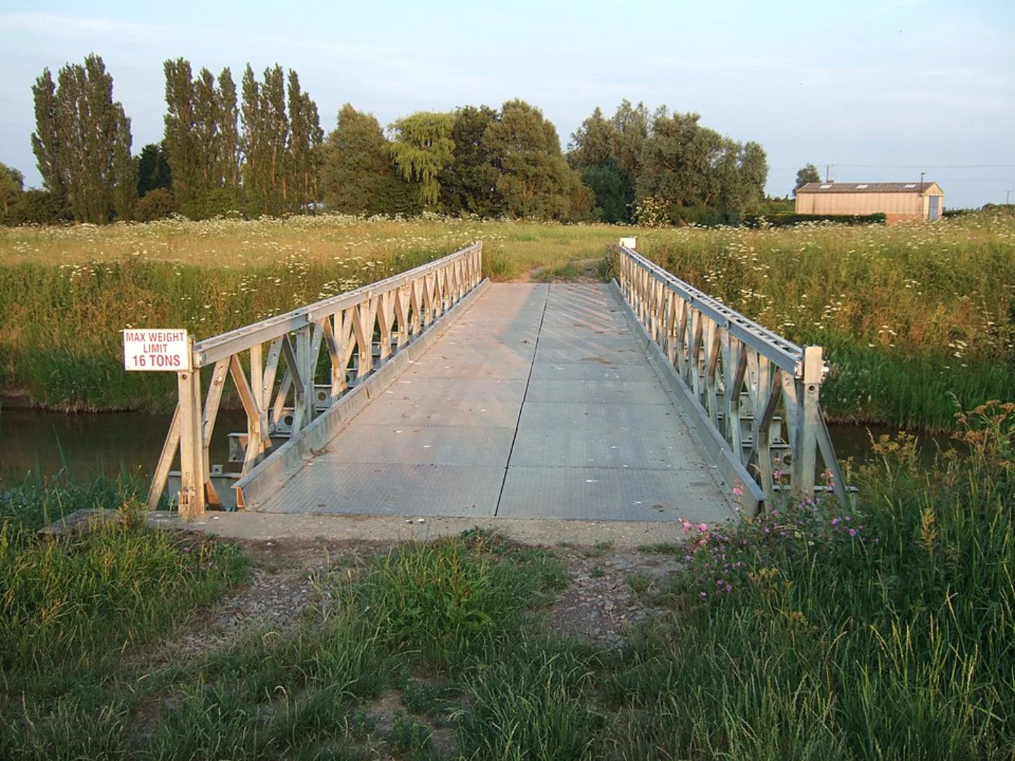 An image depicting the trail Bradley Bridge and Wiggin's Mill Bridge and its surrounding area.