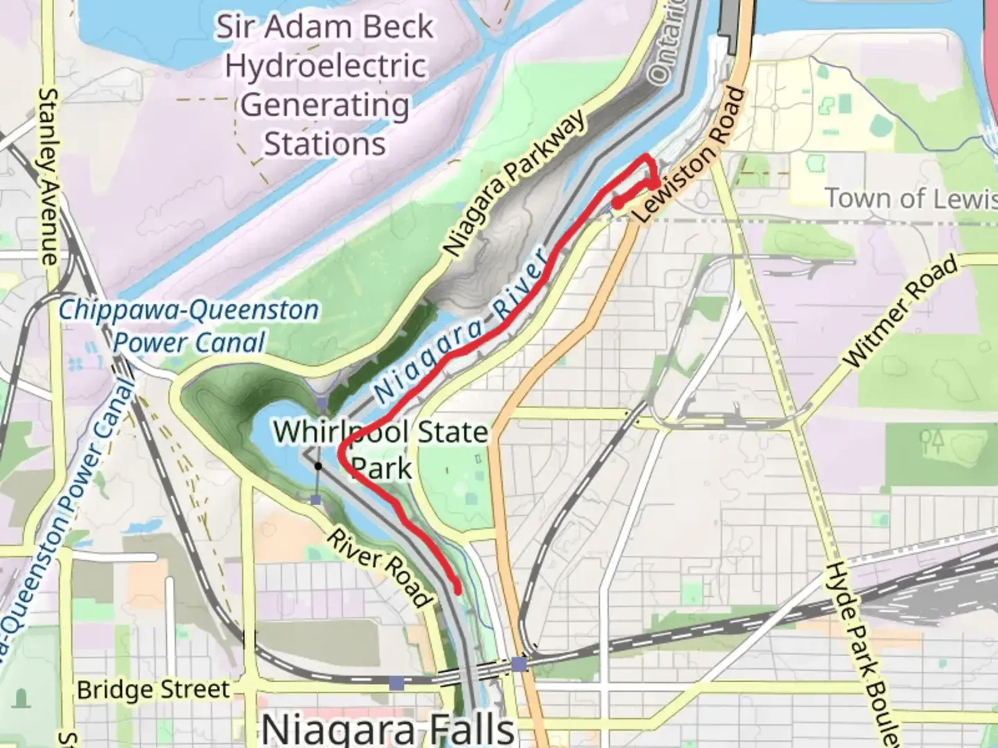 An image depicting the trail Niagara River Shore Trail from Lewiston Road and its surrounding area.