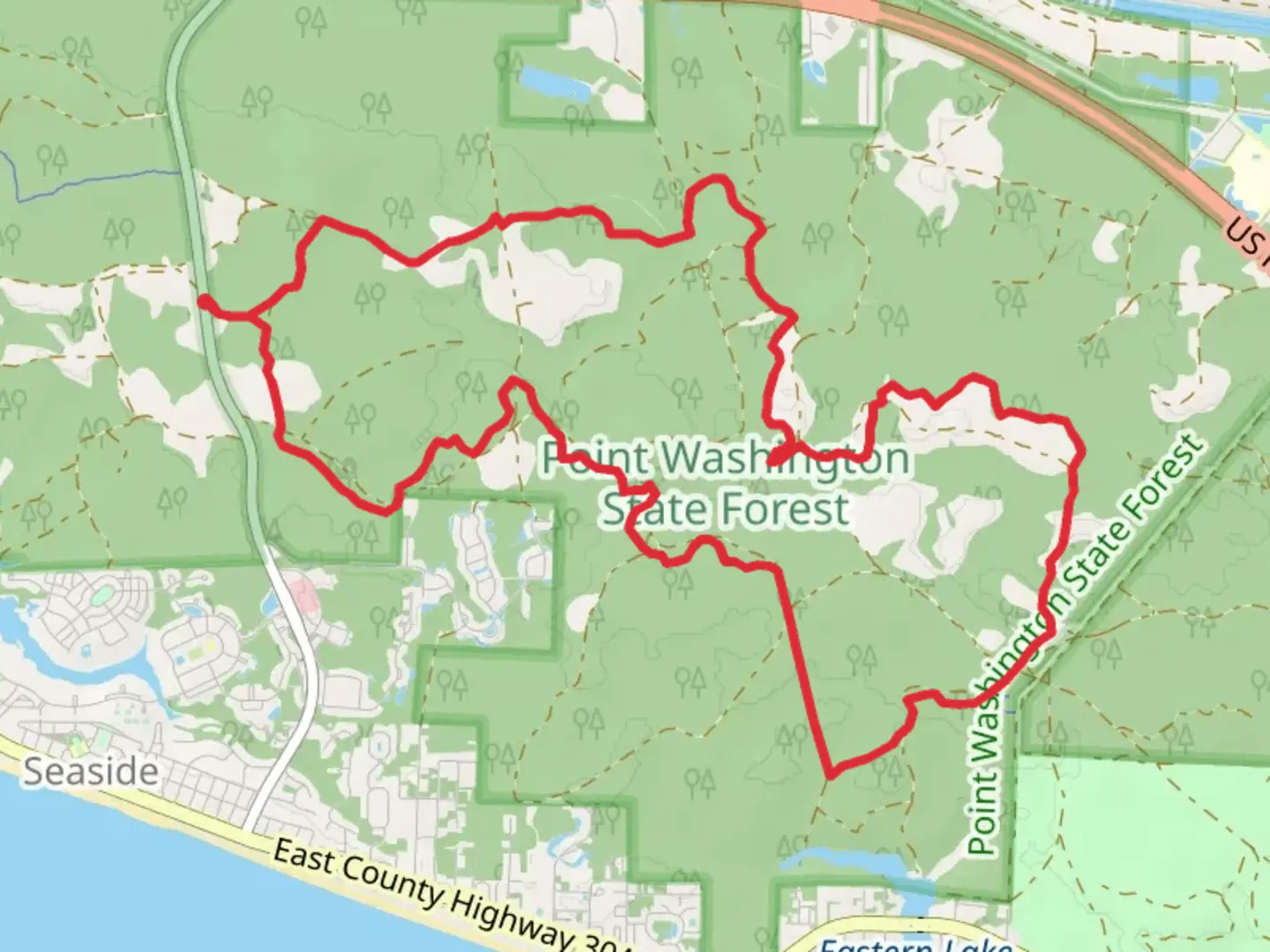 An image depicting the trail Point Washington State Forest Loop Trail and its surrounding area.