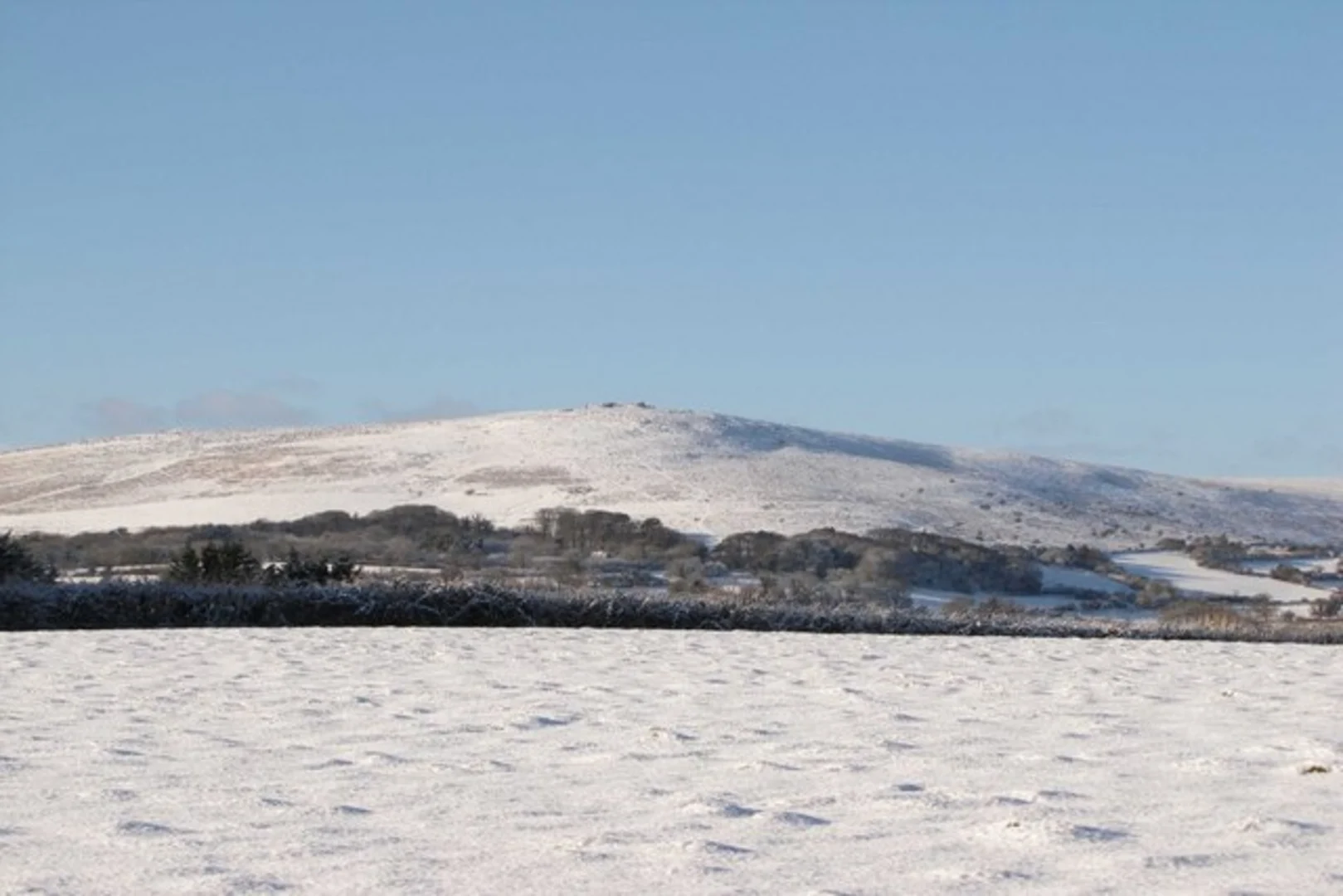 An image depicting the trail Piles Hill, Three Barrows and Ugborough Beacon Loop and its surrounding area.