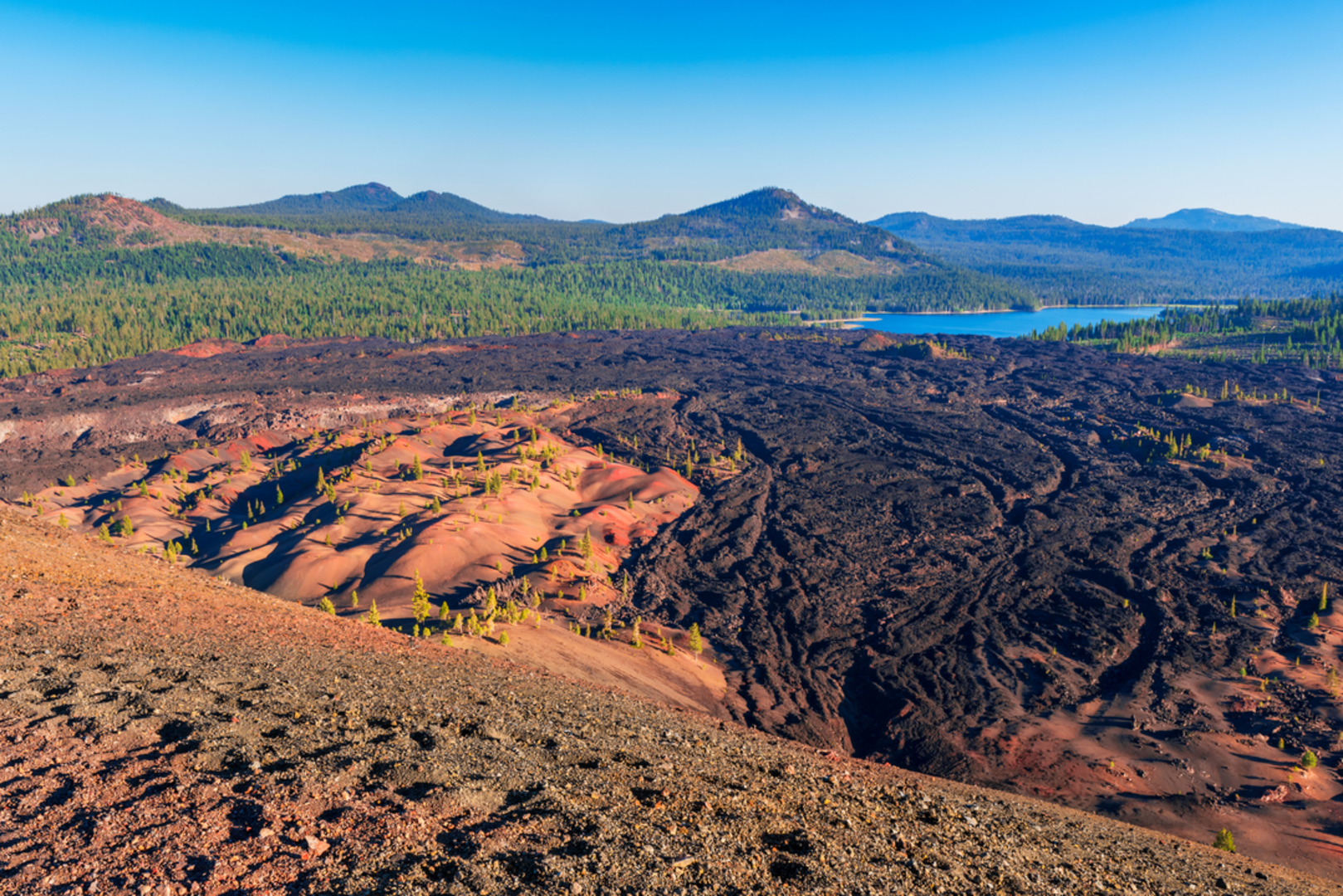 An image depicting the trail Juniper Lake to Snag Lake Trail and its surrounding area.