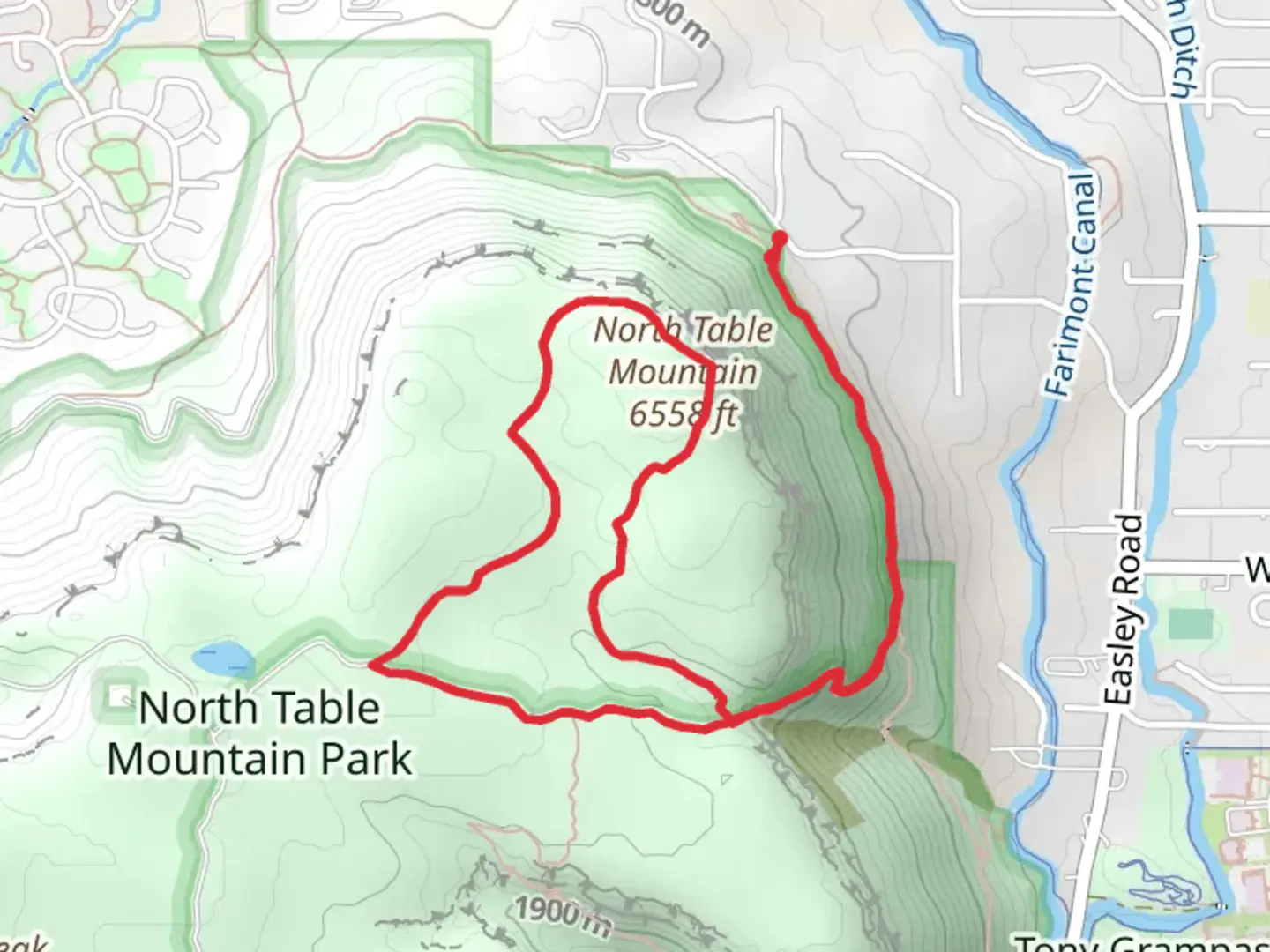 An image depicting the trail North Table Mountain via Rim Rock Trail and Mesa Top Loop Trail and its surrounding area.